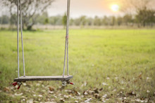 Swing Is A Hanging Seat, Often Found At Playgrounds For Children