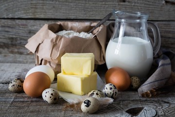 Wall Mural - Baking ingredients on rustic wood background