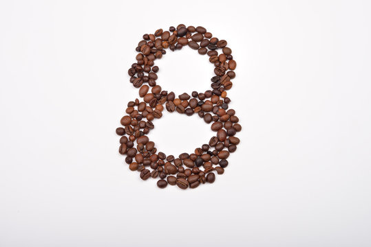 Number eight from coffee beans isolated on white background. Lov
