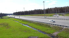 Russia, Peterhof, May 03, 2015 - Trucks And Cars Move Along The Highway On Developing High-speed Ring Road
