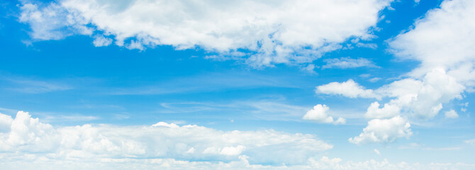 Wall Mural - white fluffy clouds in the blue sky