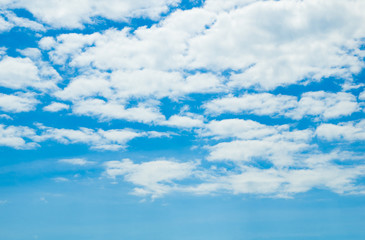 white fluffy clouds in the blue sky