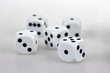 © Vista Photo - Five dices on a white table