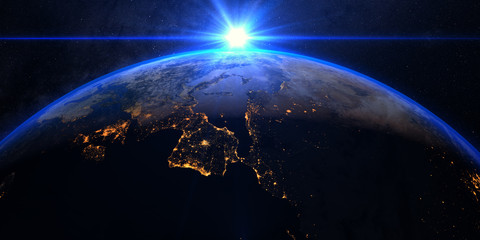 Wall Mural - planet earth with a spectacular sunrise, view on europe and africa.