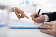 © DragonImages - Signing business contract