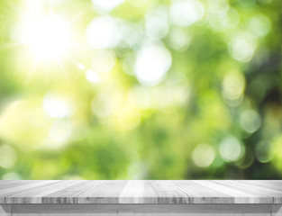 Aufkleber - Empty plank white wood table top with blur green tree bokeh back