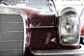 Wall Mural - Close Up of Headlight Lamp Vintage Classic Car. (Vintage Effect Style)