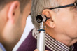 © didesign - Doctor Examining Patient's Ear