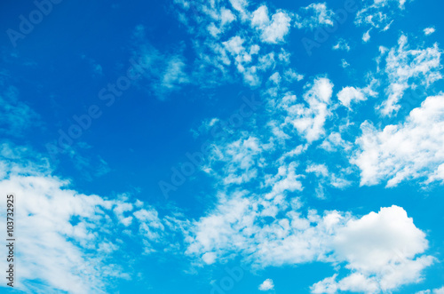 Naklejka na szafę White clouds in blue sky.