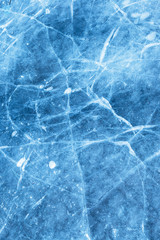  A network of cracks on a piece of blue ice with air bubble.
