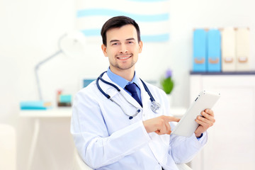 Poster - Doctor with tablet in office