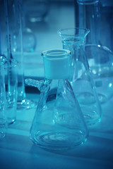 Wall Mural - laboratory glassware on table closeup