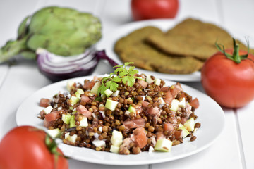 Wall Mural - lentil salad on a white table