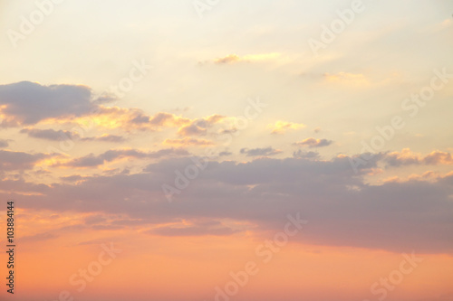 Fototapeta na wymiar beautiful sunset or sunrise with orange colored clouds background 