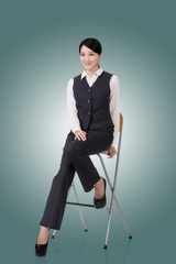 business woman sit on a chair