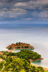 Wall Mural - View of the peninsula of Sveti Stefan from the height of the mountains.