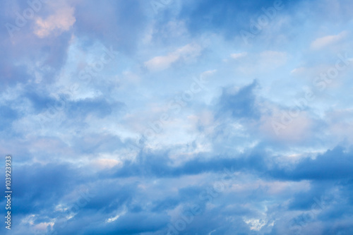 Fototapeta na wymiar dense blue clouds in twiling sky in winter