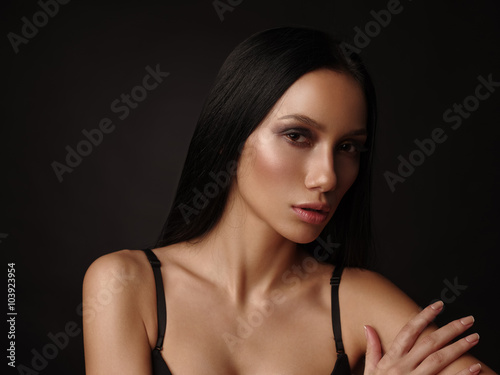 Portrait Of The Beautiful Young Girl With Dark Straight Hair
