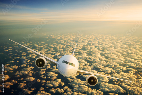 Fototapeta na wymiar Airplane in the Sky