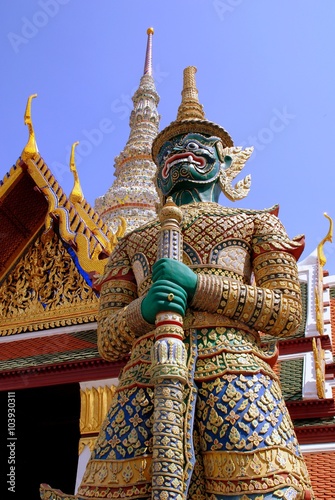Photo Bangkok, Thailand - December 20, 2006: A giant guardian demon Yak with green fa