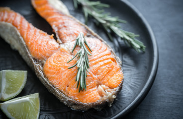 Wall Mural - Roasted trout steak with fresh rosemary