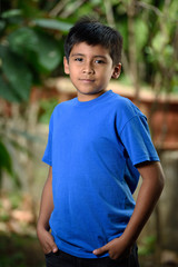 latino boy with hands  in pocket