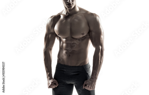 Fotografie, Obraz Strong man showing perfect abs, houlders, biceps, triceps and chest