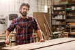 © mavoimages - Artisan craftsman with a beard in his woodwork workshop