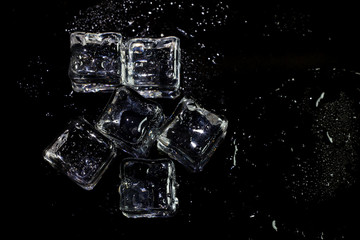 ice cubes on black background.