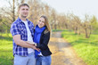 © Stanislav Samoylik - Young couple outdoors in spring, hugs, sunshine, smile
