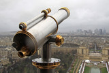 Fototapeta Paryż - PARIS, FRANCE -16 DECEMBER 2011: Spyglass and a view from Eiffel Tower at Paris