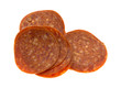 Slices of pepperoni on a white background.
