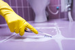 Clean the tile with a toothbrush.
