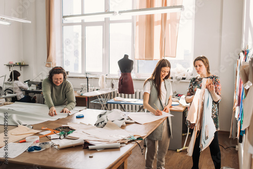 Valokuva Collaboration designer and tailors in the shop