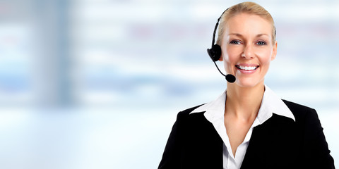 Smiling agent woman with headsets.