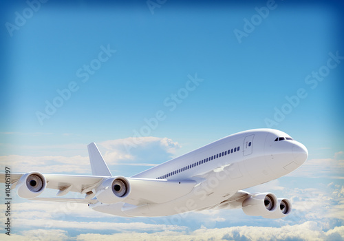 Naklejka dekoracyjna Passenger jet plane flies above the clouds