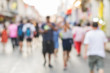 © surasaki - Blurred people walking on the street of old town