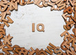 Word IQ (Intelligence quotient ) made with wooden letters