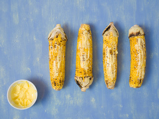 Wall Mural - rustic grilled golden corn cob