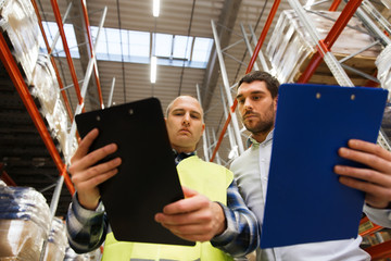 Poster - worker and businessmen with clipboard at warehouse