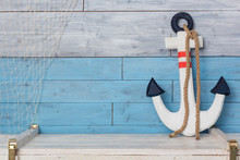 Anchor On Wood Background Blue And White