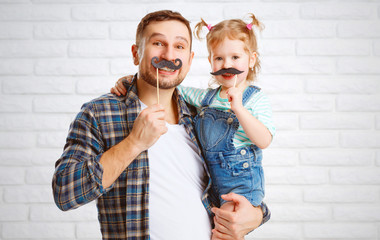 funny family father and child with a mustache