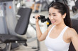 © zhu difeng - beautiful girl working out in modern gym