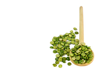 Wall Mural - Split peas in wooden spoon isolated on white background