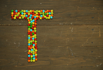 Letter T made with candy