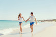 © Sergey Nivens - Romantic young couple on the beach
