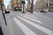 Paris, France, February 9, 2016: Pedestrian Cross Road In A Center Of Paris, France