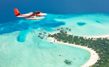 Sea Plane Flying Above Maldives Islands