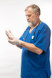 © kostyha - doctor wears latex gloves