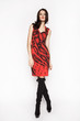 © EVGENY FREEONE - Brunette woman in fashion red dress